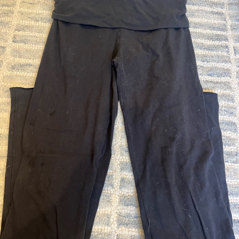 Black Skims fold over flare pants